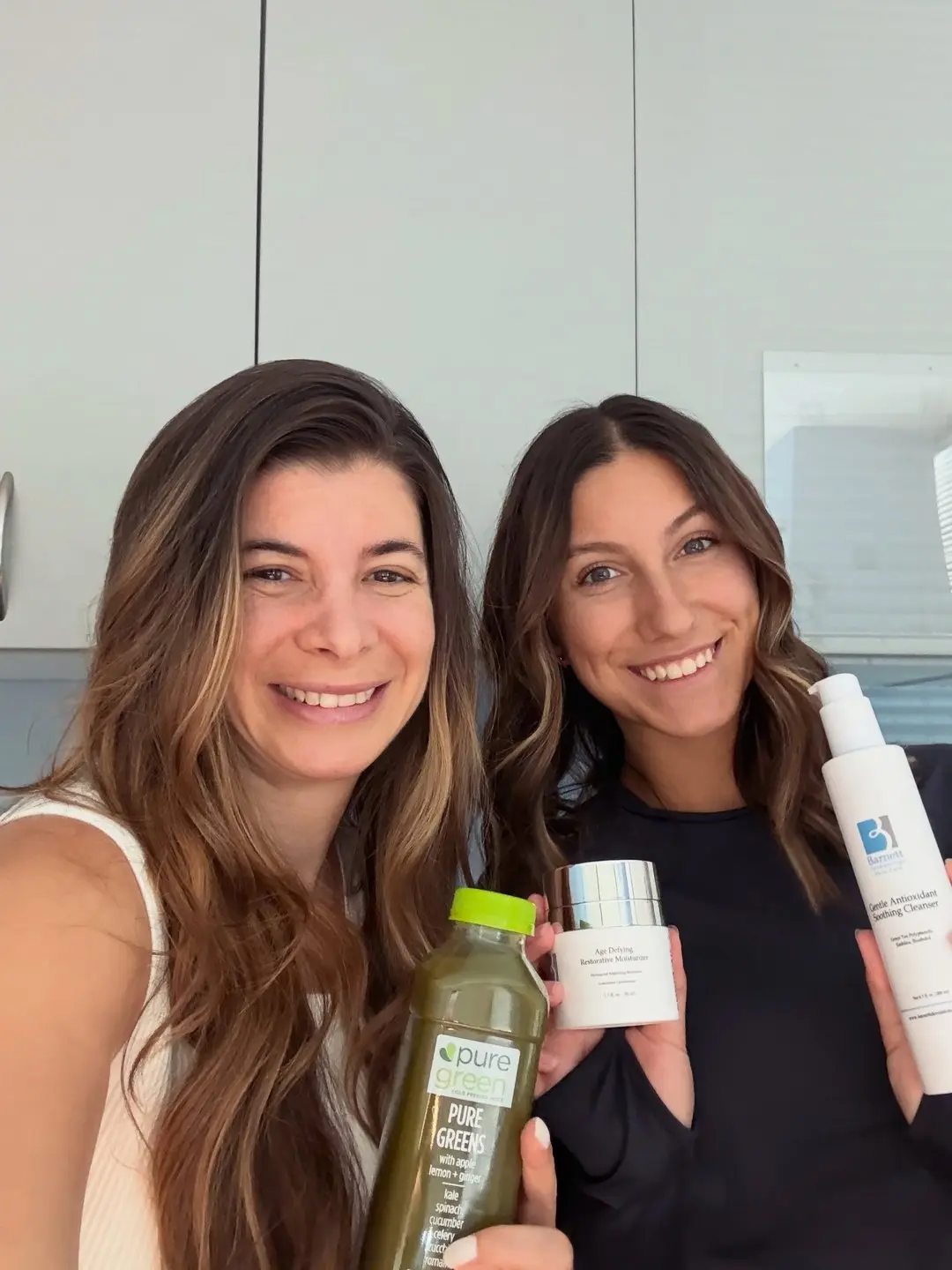 Guests with Pure Green smoothies and wellness products at the Garden Shops store
