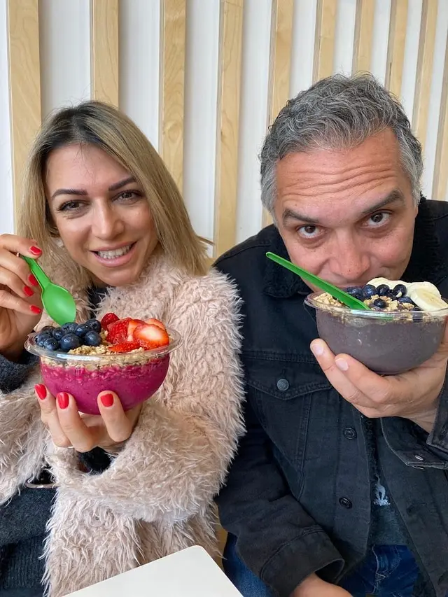 Guests with acai bowls at Pure Green Lincoln Park