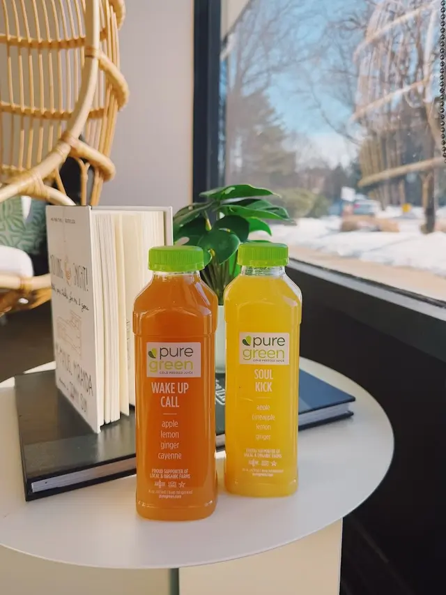 Bottles of Wake Up Call and Soul Kick cold-pressed juice at Pure Green Newtown