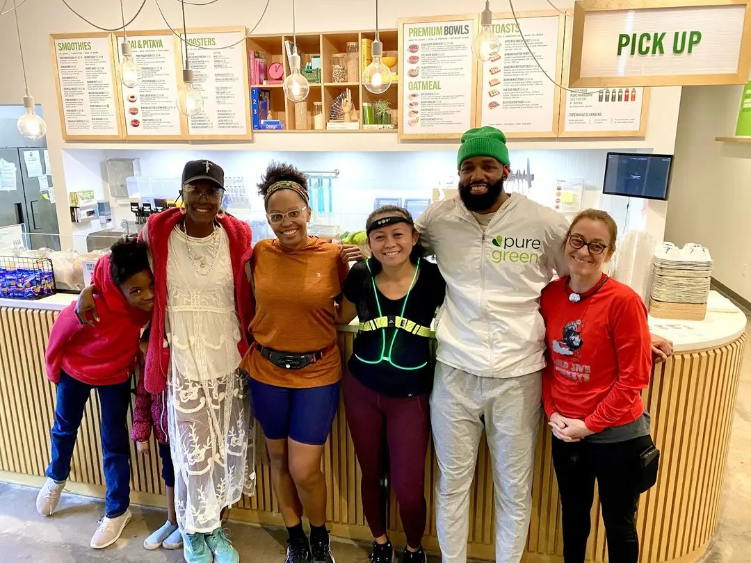 Pure Green Tempe team and guests at the pickup counter